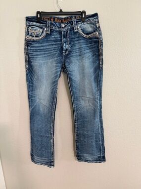 Rock Revival Women’s “Dellah” Blue Boot Cut Jeans with Embroidered Pockets 32x32